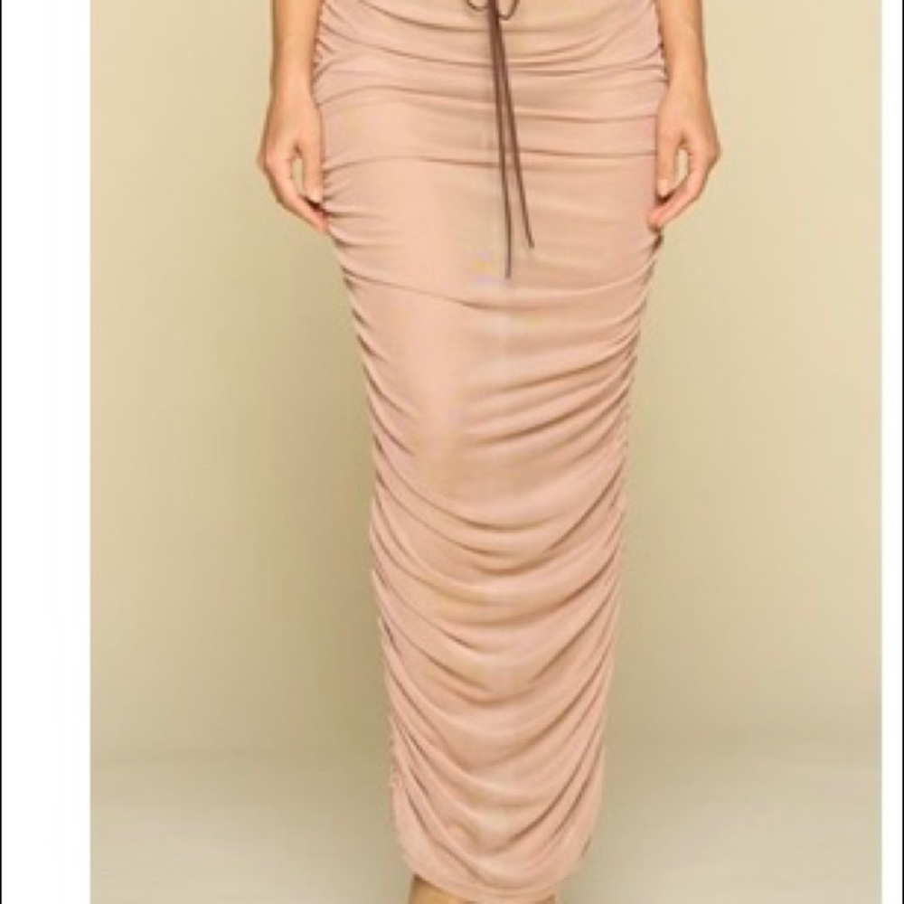 See through mesh ruched skirt. Cream colored.